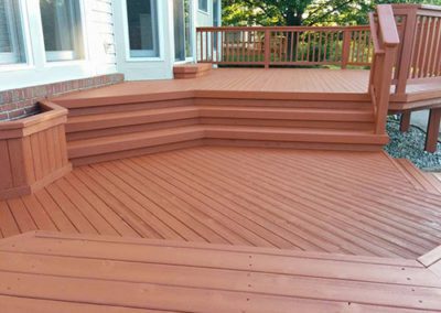 a deck with a red paint color