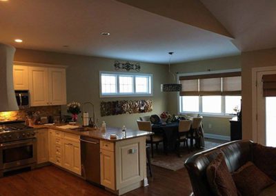a kitchen and dining area with new painted walls
