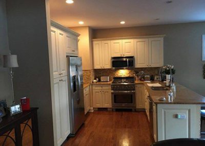 a kitchen with gray painted walls