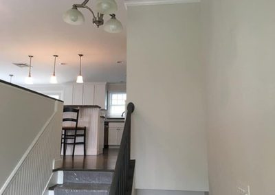 white painted walls in a stairway